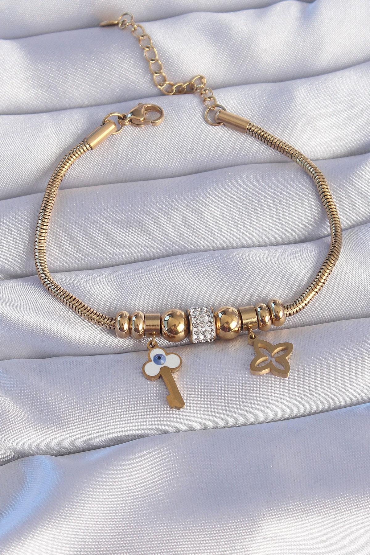 Çelik Gold Renk Zirkon Taşlı Yonca Detay Nazarlı Anahtar Tasarımlı Bileklik