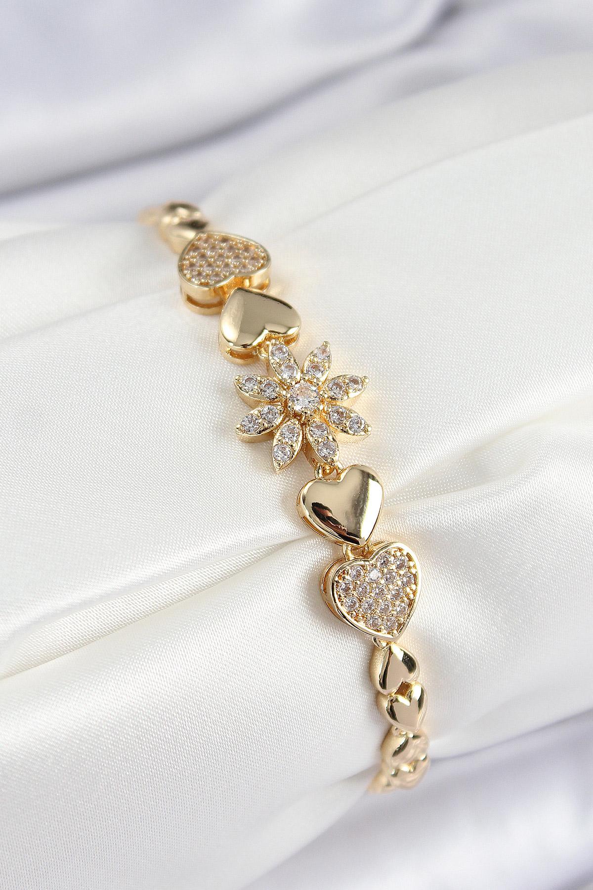 Pirinç Zirkon Taşlı Kalp Detaylı Çiçek Model Gold Renk Kadın Bileklik