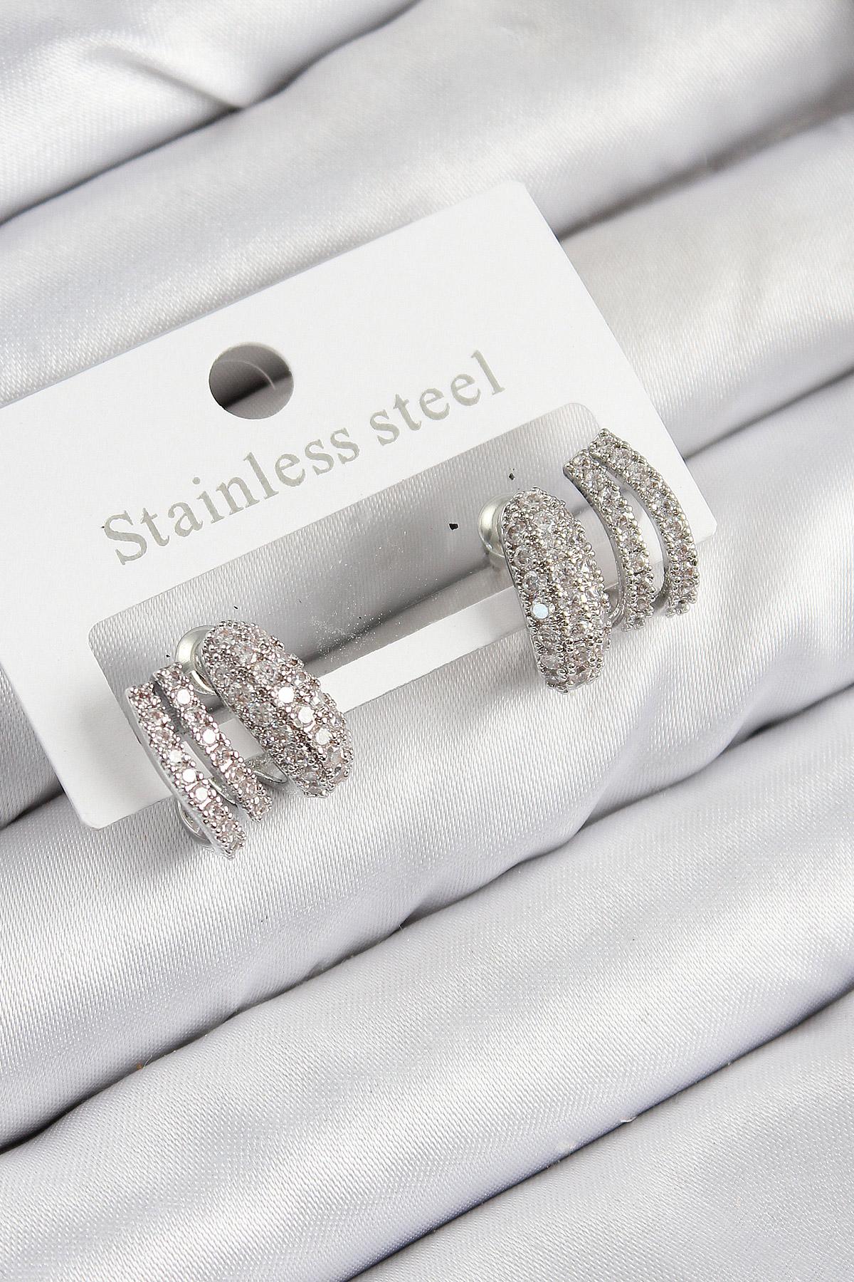 Pirinç Zirkon Taşlı Kıvrımlı Model Gümüş Renk Kadın Küpe